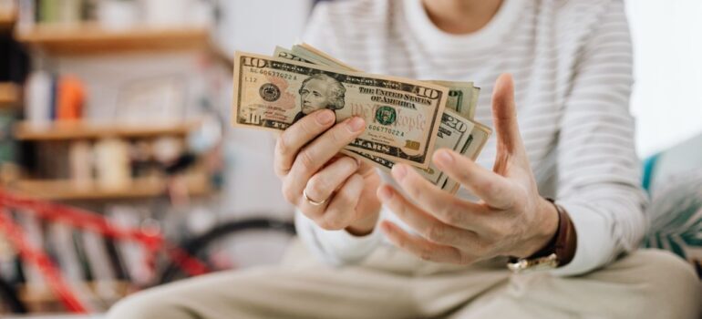 A woman holding money
