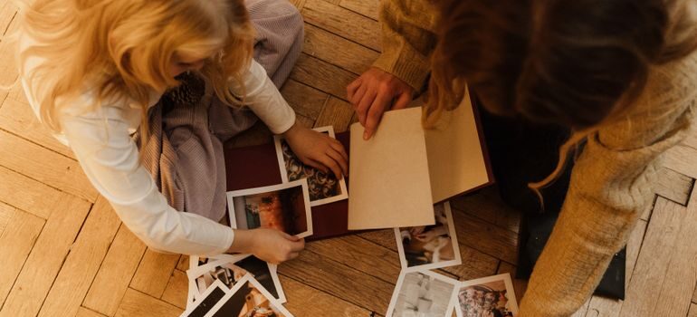 People sorting photos