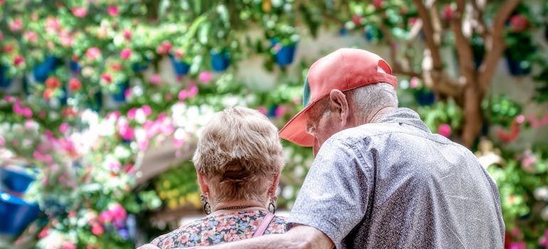 Seniors hugging each other
