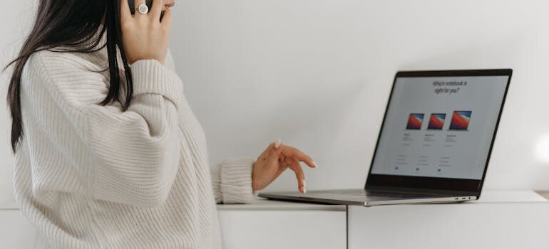 a woman using a laptop