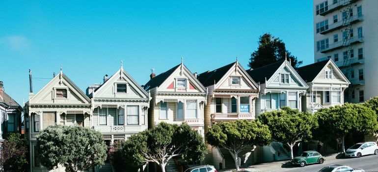 Cars in front of houses