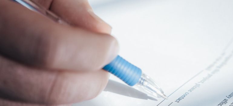 A person signing a document