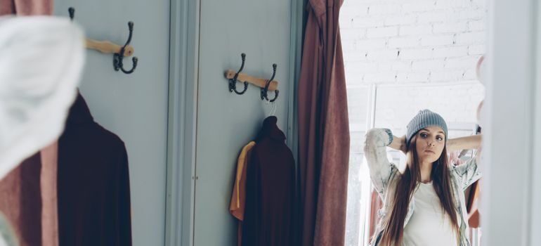 A woman trying on clothes