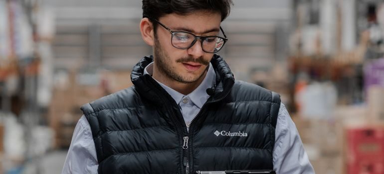 A man looking at a tablet
