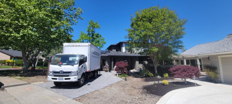 Neostart truck in front of a house