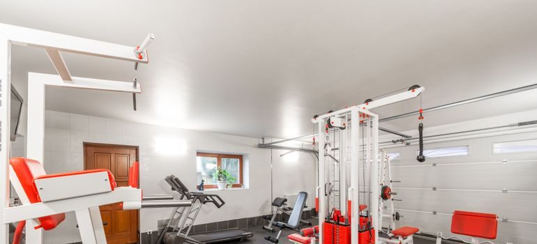 White and orange equipment in a home gym