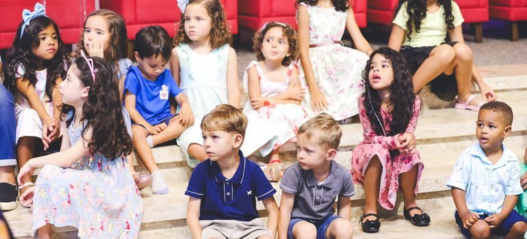 Kids sitting on stairs