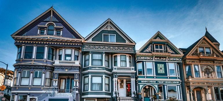 Row of colorful San Francisco Victorian homes representing typical SF housing stock